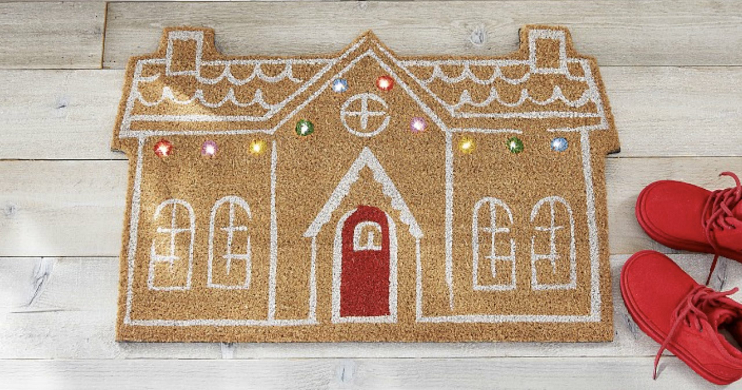shop-pottery-barn’s-gingerbread-house-doormats,-featuring-actual-christmas-lights