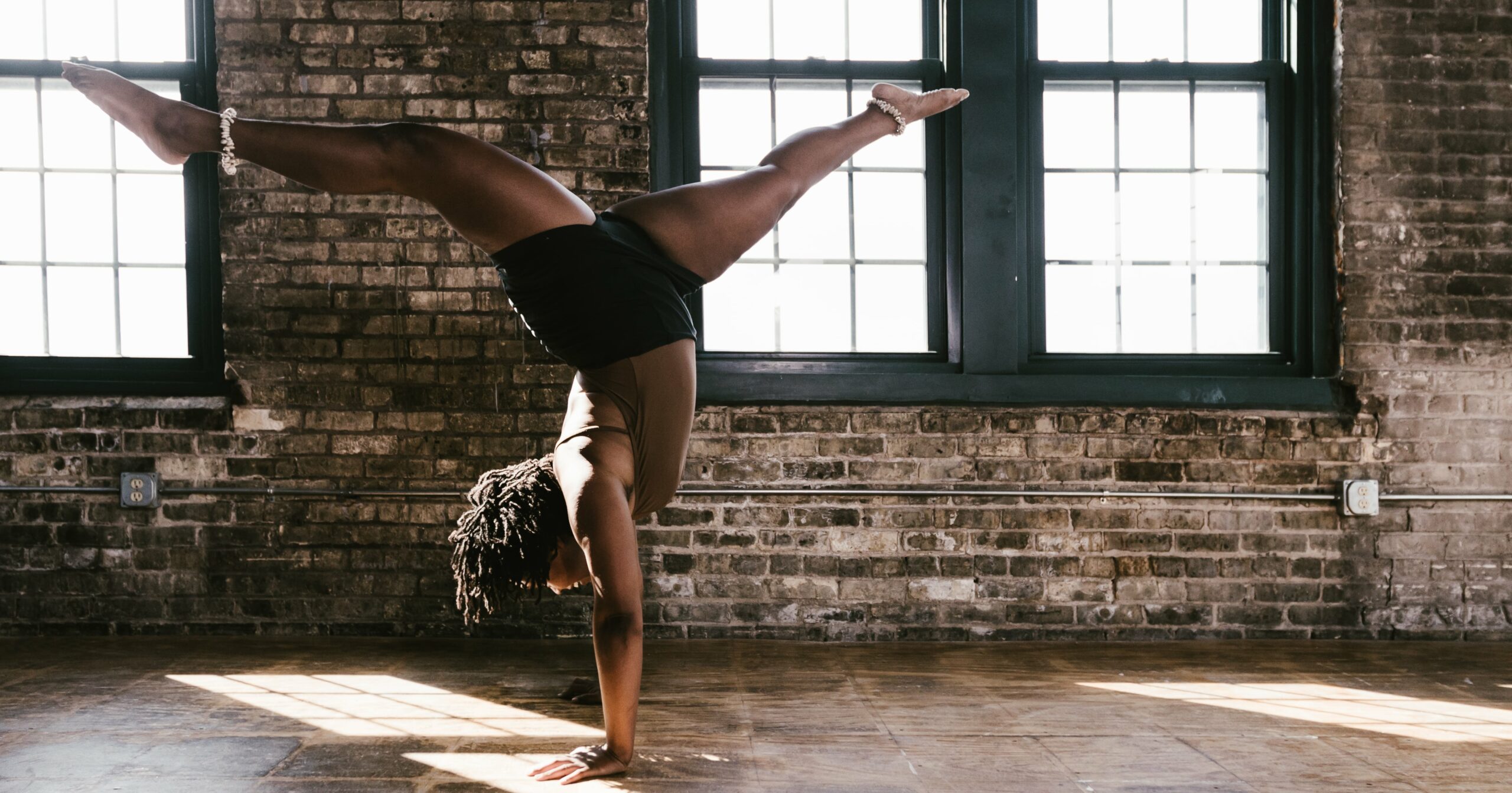 9-moves-to-help-anyone-master-a-basic-handstand