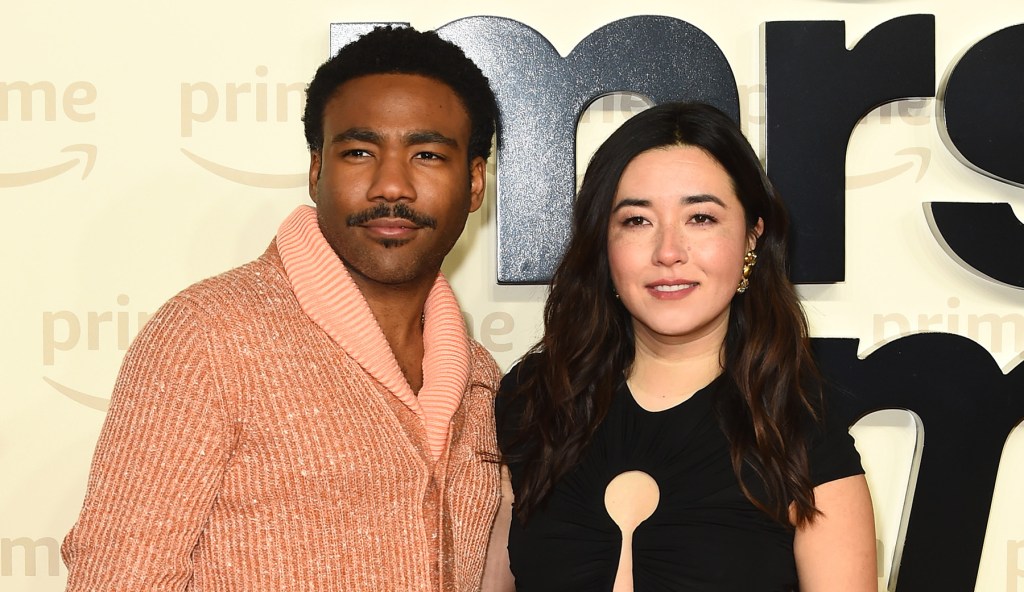 donald-glover-dons-‘color-of-the-year’-peach-fuzz-and-maya-erskine-wears-schiaparelli’s-keyhole-dress-for-‘mr-&-mrs-smith’-uk. premiere