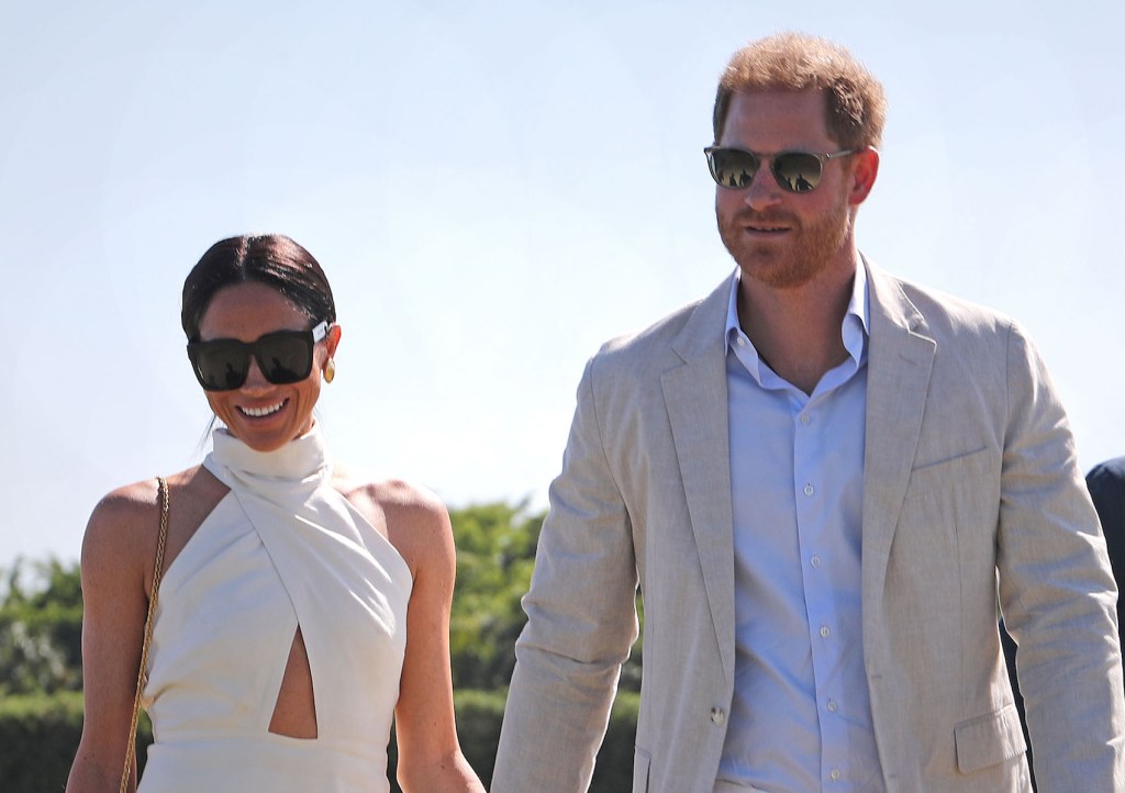 meghan-markle-showcases-quiet-luxury-in-heidi-merrick-‘ginger’-dress-with-prince-harry-at-royal-salute-polo-challenge 2024