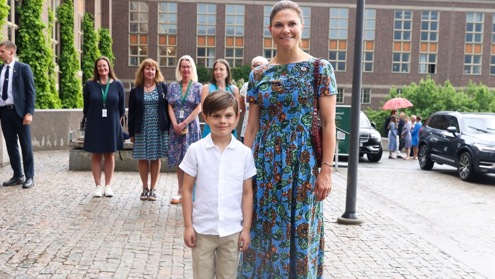 crown-princess-victoria-of-sweden-indulges-in-maximalist-floral-prints-in-alberto-biani-midi-dress-for-museum-visit-with-son-prince oscar