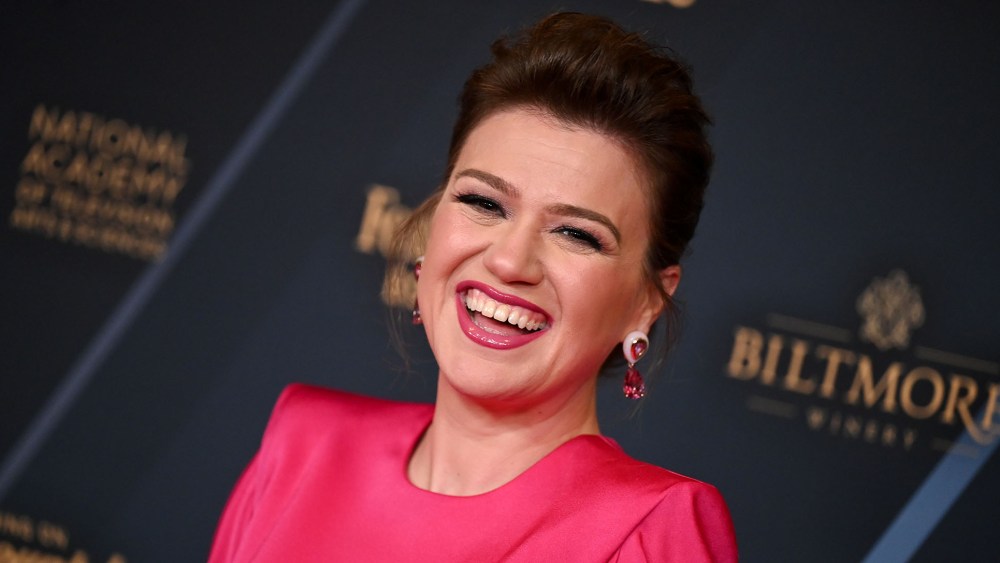 kelly-clarkson-wins-best-talk-show-award-with-sharp-shoulders-in-hot-pink-alex-perry-dress-at-daytime-emmy-awards 2024