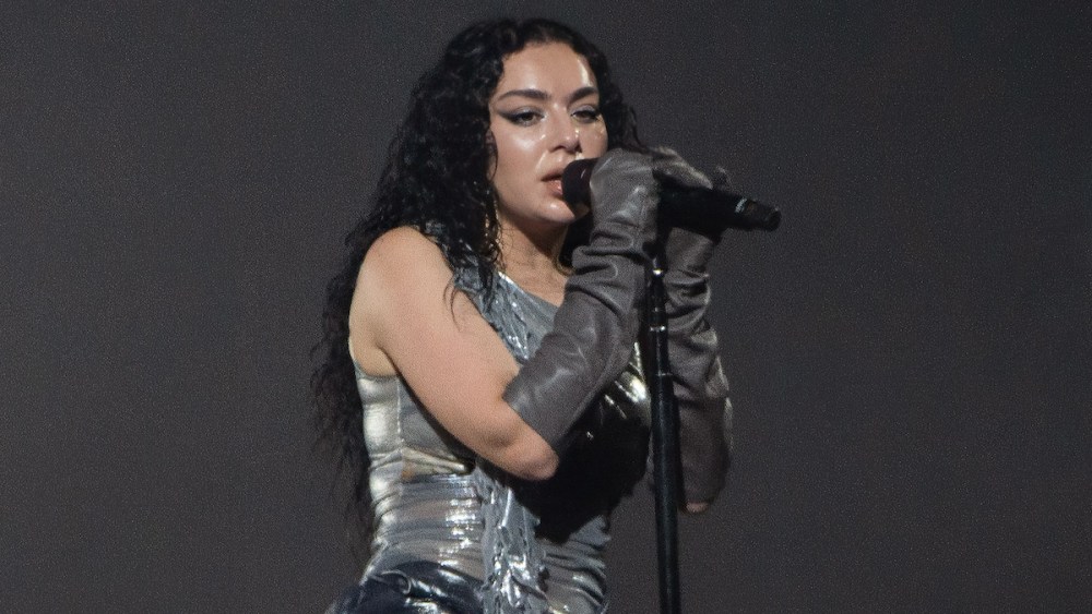 charli-xcx-layers-up-in-tonal-silver-minidress-with-futuristic-twists-for-roskilde-festival-2024-performance-in-custom-rafaela pestritu