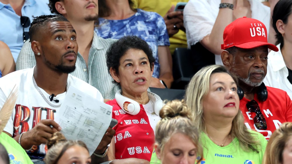 simone-biles’-husband-jonathan-owens-wears-graphic-tribute-shirt,-parents-nellie-and-ronald-celebrate-team-usa’s-gold-medal-with-patriotic-merch-at-paris olympics