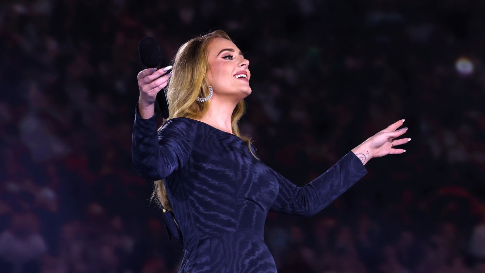 adele-models-dior-moire-in-navy-gown-with-floor-length-train-for-opening-night-of-munich residency