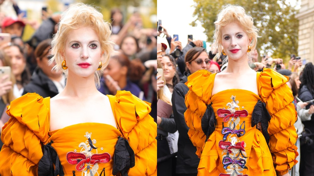 hayley-williams-embraces-elizabethan-glamour-in-puff-sleeve-orange-dress-at-vivienne-westwood’s-spring-2025-show-during-paris-fashion week