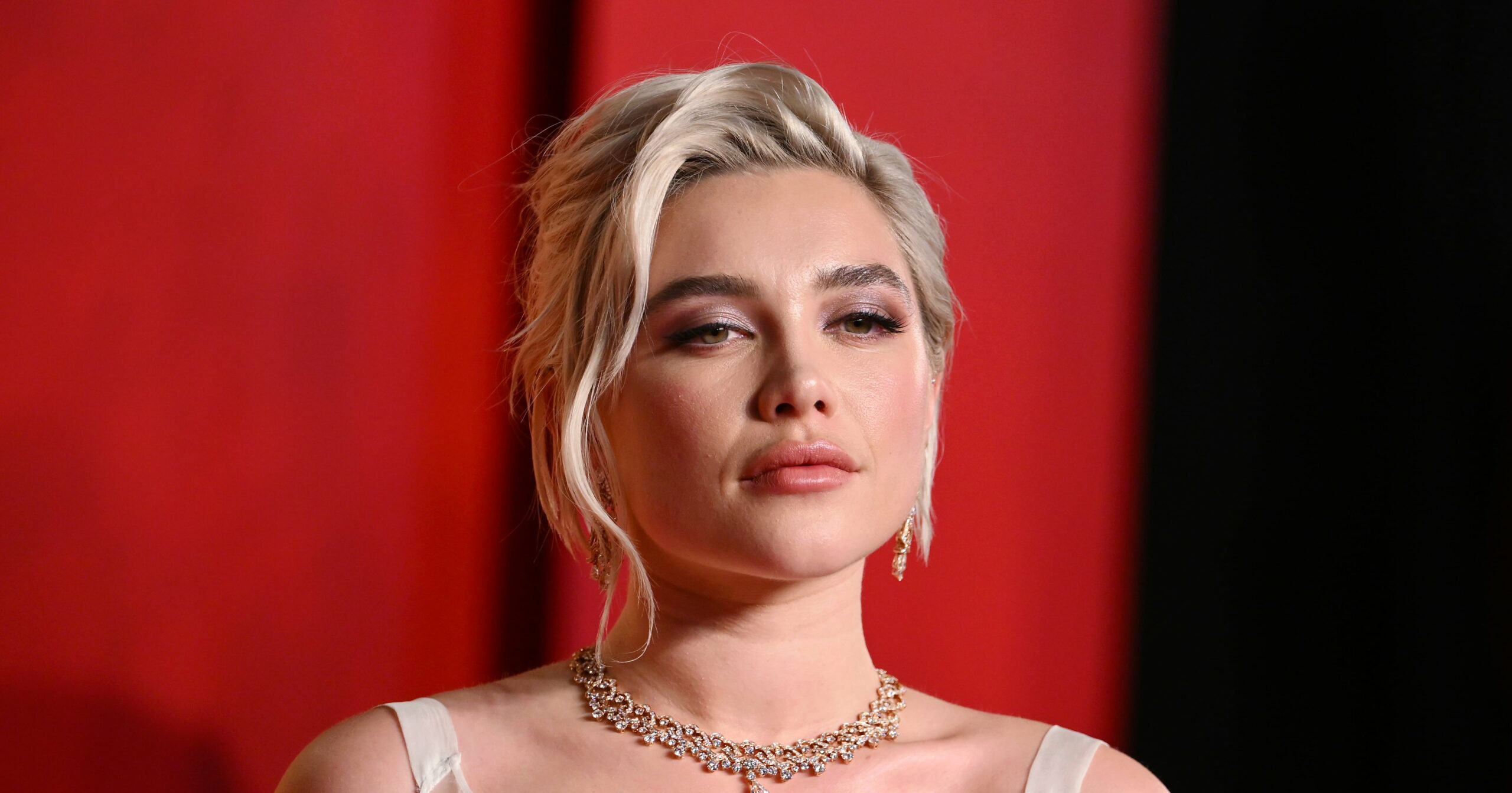 see-florence-pugh’s-tattoos,-from-a-bee-to-a-matchstick