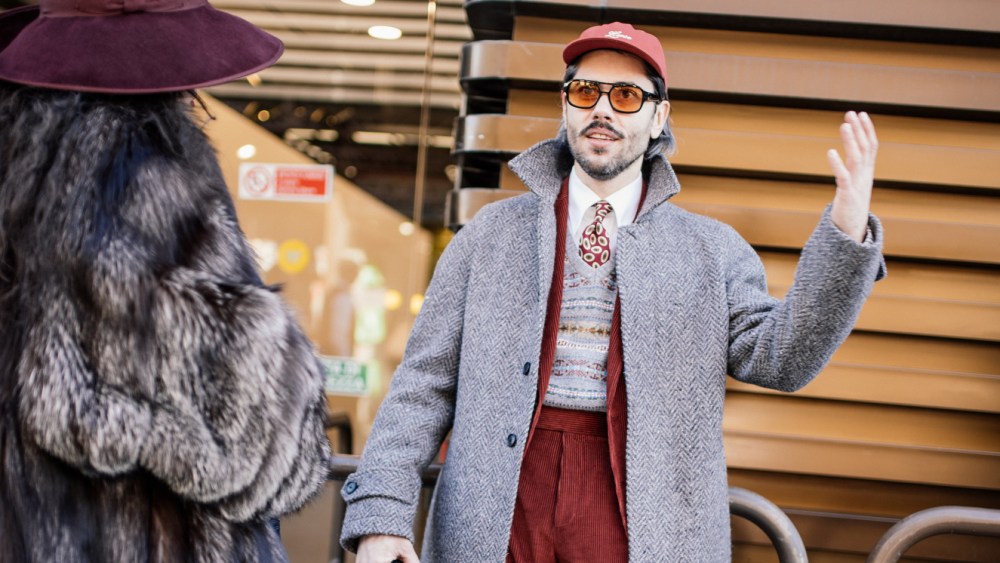 best-pitti-uomo-street-style-–-maxi-coats,-heritage-british-plaids-and-americana-revival-defined-the-look-of-the season