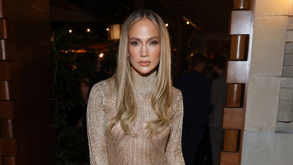 jennifer-lopez-glows-in-gold-tom-ford-dress-at-caa’s-pre-oscars party