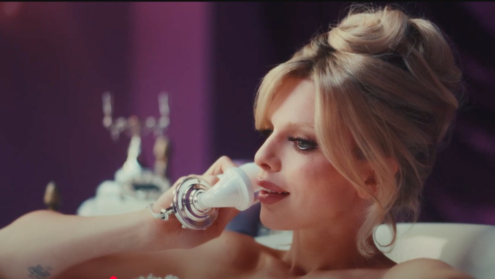 julia-fox-channels-retro-glamour-for-kourtney-kardashian-barker’s-lemme-play campaign