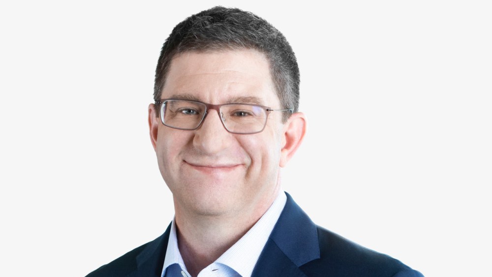 pvh’s-zac-coughlin-stepping-down-as-cfo-in-jump-to siriusxm