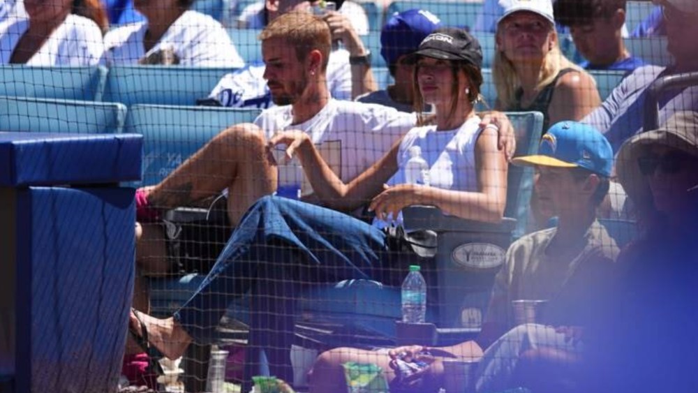 hailey-bieber-takes-the-kitten-heel-thong-sandal-trend-to-dangerous-territory:-a-baseball game