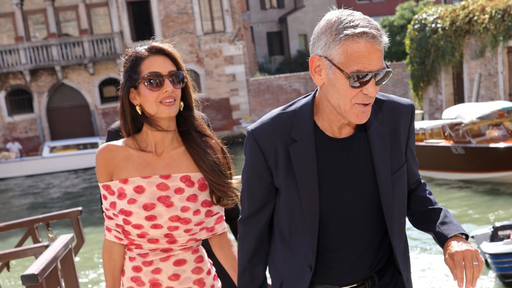 amal-clooney-leans-into-dolce-vita-style-with-raspberry-prints-in venice