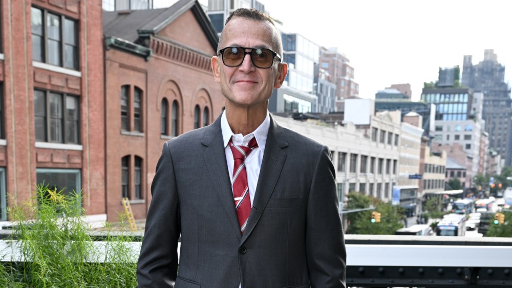 cfda’s-steven-kolb-tries-to-restrain-peta-protesters-at-cos-fashion show