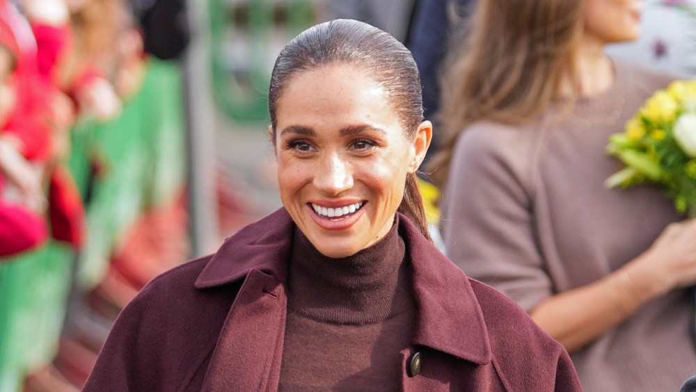 meghan-markle-revisits-her-royal-era-monochrome-style-for-first-joint-uk.-outing-with-prince-harry-since-their-return-to england