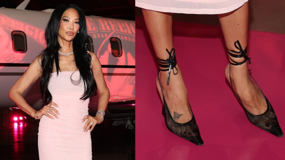 kimora-lee-simmons-adds-edge-to-her-soft-pink-look-with-black-mesh-pumps-at-the-true-religion-x-baby-phat-runway show